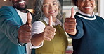 Thumbs up, teamwork and business people with smile, hands and laugh for positive review in office. Face, support and employees with like sign for feedback, agreement gesture and yes for approval