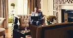 Business travel, employee and man with laptop in hotel, research or review market update on website. Senior investment banker, online and person with tech, typing and luggage on international trip