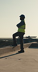 Construction, thinking and man on rooftop for planning, reflection and civil engineering in city. Architecture, outdoor and worker with idea, crossed arms and ppe for safety compliance or renovation