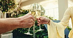 Cheers, hands and couple in hotel with champagne, partner vacation or bonding trip for anniversary. Romance, toast or people in resort with drink, connection or loving moment on honeymoon celebration