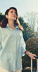 Thinking, arrival or woman outdoor with suitcase, positive mindset or reflection on summer trip. Wind, below or mature person at hotel with luggage, holiday start or peaceful perspective on getaway.