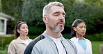Yoga, class or man outdoor with meditation, calm practice or collaboration in fitness activity. Peace, team or mature person with fresh air, group wellness or mindset improvement in holistic exercise
