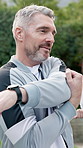 Preparing, stretch or man outdoor with fitness class, arm mobility or injury prevention in physical activity. Sport, smile or mature person with start, warm up or muscle improvement in group session.