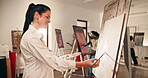 Painting, smile and class with man in workshop for creative, inspiration and brush stroke technique. Passion project, artist hobby and easel with people in studio for design, drawing and art