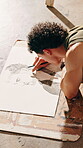 Art, technique and man sketching in workshop with paper, texture and detail with creativity. Studio, male person and pencil for portrait drawing with shading, project and professional artist