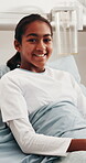 Medical, face and girl in hospital with laugh, happy moment and recovery relief in post operation. Healthcare, portrait and patient with humor, wellness service and good mood with pediatric treatment