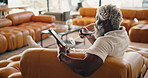 Tablet, relax and man on sofa with wine, online reading and ebook for break, rest and weekend. Home, rest and mature person with alcohol, drink and tech for website, internet and connection on couch