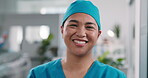 Healthcare, face and woman in hospital with pride, surgical nurse and about us in patient care. Wellness, portrait and happy doctor with mask, preoperative specialist and ambition in medical industry