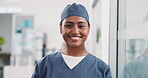 Medical, happy or woman in hospital with face, surgical assistant or confidence in patient care. Smile, portrait or nurse in clinic with mask, wellness specialist or about us in healthcare industry.