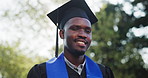 College, black man and student with face for graduation, award and milestone for education goals. Portrait, flare and person with ceremony, degree and success for achievement and university diploma