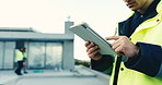 Hands, man and engineer on rooftop with tablet, research and inspection report for construction. Male person, scroll and reading at site with digital, blueprint and safety checklist for architecture
