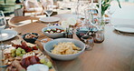 Celebration, food or charcuterie board outdoor with snack, fruit arrangement or meal setup at event. Party, nutrition or catering with platter, cuisine or appetizer selection in backyard gathering.