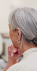 Therapy, meeting and old woman listen in support group for mental health advice, help and guidance. Back, senior person and hear wellness tips in clinic for psychology, healing or counseling session.