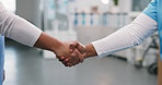 Healthcare, deal or nurse in hospital with handshake, greeting or cooperation in treatment plan. Introduction, collaboration or men with shaking hands, agreement or opportunity in medical partnership