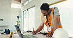 Man, drawing and blueprint at construction site for engineering design, home renovation and building. Engineer, person and floor plan illustration in house for remodeling project, layout and review.