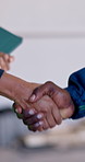 People, meeting or handshake with business agreement for deal, partnership or introduction together. Closeup, employees or colleagues shaking hands with greeting for thank you, teamwork or onboarding