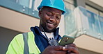 Architect, typing and black man with phone in city for communication or outdoor network service. Male person, contractor or civil engineer texting with smile for mobile chatting app or connection