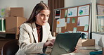 Woman, laptop and reading in small business for logistics, distribution schedule or stock management. Entrepreneur, tech or online in office for website update, email feedback or research for supply