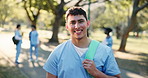 Face, park or happy man for nursing residence, medical internship or scholarship in medicine school. Portrait, male person or healthcare nurse with smile for outdoor service, learning or education