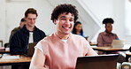 College student, face and happy man with laptop, knowledge and confident with scholarship in class. University, portrait and person with smile, learning and laughing with technology and education