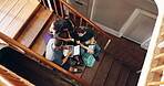 People, stairs and college students with technology for study, group assignment, or research. Above, man and women at university with laptop, tablet and books for discussion, thesis or education