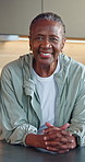 Fitness, face and elderly woman in home with smile for break, wellness and activewear for health. Kitchen, happy black person and portrait with sportswear for exercise lifestyle, laugh or retirement