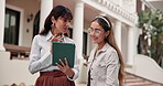 Student, woman and teacher with tablet in university for education, learning or training assistant. Female people, lecturer or discussion with academic helper or technology for curriculum on campus