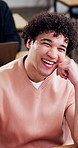 Happy, college and face of man in classroom for learning, education and lesson for exam prep. Portrait, laugh and student at university for lecture notes, knowledge and studying for phd course