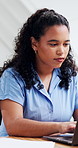 Student, woman and typing in classroom with laptop, college education and AI for digital assignment. Person, study and online research in university with computer, assessment or knowledge for thesis.