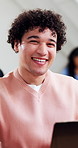 Face, university and man in classroom on laptop for learning, education and research for assignment. Portrait, happy and student on computer for lecture notes, knowledge and essay for phd at college