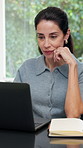 Laptop, thinking or woman in company, reading guest list or planning for event management review. Computer, mature person or coordinator in workplace for problem solving, venue budget or typing email
