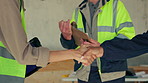 Construction, team and shaking hands at site for greeting, meeting or discussion with tablet. Engineer, people or handshake with tech for building plan, checklist or welcome for project partnership