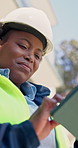 Engineer, smile and woman with tablet in building, low angle and planning for property development. Civil engineering, online and black person with tech, happy and scroll design on construction site