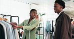 Fashion, choice and customer with smile in boutique, shopping and consultation for outfit selection. Happy people, walk and assistance for client, discussion and advice for clothing decision in store