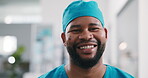 Medical, face and man in hospital with smile, surgical assistant and pride in patient care. Wellness, space and happy nurse in clinic with mask, preoperative specialist or about us in health industry
