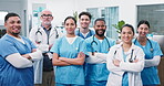 Medical, team or face in clinic with arms crossed, patient care or service ready in primary health. People, doctors and nurses with smile in ward for healthcare integrity, shift start and confidence