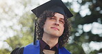 Thinking, graduation and happy with man in college for education success, future and vision. University goal, mindset and low angle with person outdoor for inspiration, smile and student growth
