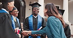 University, handshake and teacher with student for graduation, celebration and milestone for education. Happy, people and campus with ceremony, degree and success for achievement or college diploma