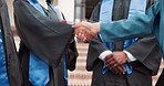College, handshake and students with applause for graduation, award or education milestone. Shaking hands, campus and people with ceremony, degree and success for achievement and university diploma