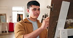 Man, artist and painting in class with easel, drawing and creative learning for gallery showcase. Male person, painter or sketch in workshop with paint brush, artistic process and artwork masterpiece
