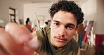 Face, man and painting in class with brush, drawing and creative lesson for gallery showcase. Portrait, person and artist in workshop with pov, practice technique and artwork sketch for masterpiece