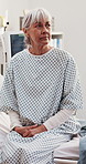 Worried, thinking and old woman on hospital bed with medical diagnosis, illness and risk of cancer. Sick, senior person and concern in clinic with reflection, thoughts and wait for disease results.