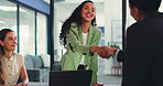 Women, handshake and business deal in meeting with smile, partnership and agreement for investment. Happy, team and shaking hands in office with b2b negotiation, finance acquisition or collaboration.