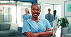 Nurse, face or happy woman with confidence in clinic for medical assistance or health advice. Portrait, female person or healthcare worker with smile or arms crossed for nursing help in hospital