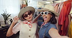 Fashion, funny face and selfie with friends in shopping mall for consumerism or retail purchase. Hat, social media and sunglasses with excited women in clothing boutique for bargain or store sale