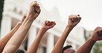 Hands, people and fist outdoor for protest, movement and call to action for violence awareness. Activist, community and rally resistance for humanitarian crisis, honoring victims and justice demand