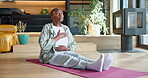 Zen, old woman and breathing in home, meditation and stress relief on break and spiritual awareness. Calm, retirement and senior person with inner peace on weekend,  and wellness in lounge