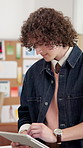 Tablet, research and typing with man in office for textile sample, planning and project. Distribution data, fabric inventory and online tailor supplier with employee in agency for sales forecast
