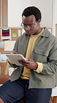 Tablet, research and reading with black man in office for textile sample, planning and project. Distribution data, fabric inventory and online tailor supplier with employee for sales forecast