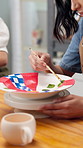 Hands, woman and painting ceramic in class for art, creative decoration hobby and handmade craft. Paintbrush, person and pottery in workshop for skill development, artistic process and inspiration